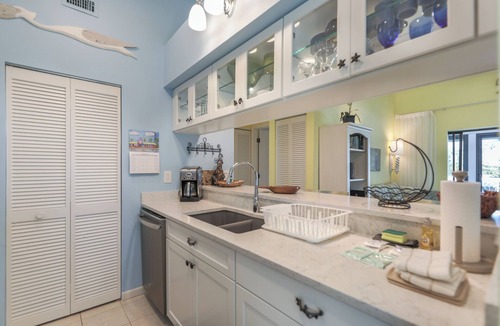 The Dunes House | Nicely updated Sanibel duplex home located in The Dunes with lake view.