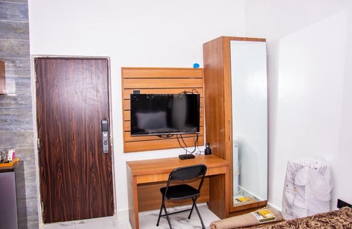 Abuja Apartment | NIFEWAT APARTMENT leed studio apartment with gym, Netflix and WiFi