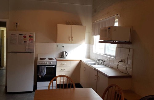 Hat Head House | No better location - opposite the creek and a short stroll to the club.