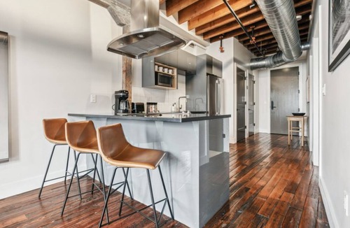 Central Business District Hotel | NOLA Chic: Explore Bourbon Street from Your 4BR Condo