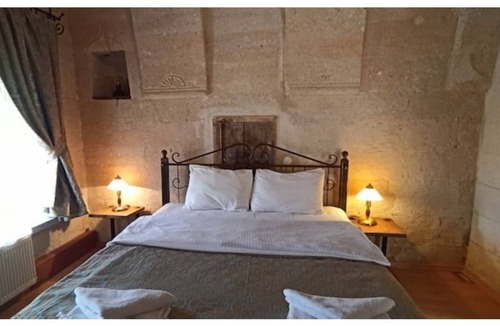 Goreme House | Nomads - Traditional Arch Stone room at the center