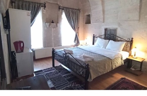 Goreme House | Nomads - Traditional Arch Stone room at the center
