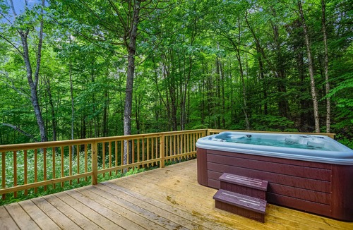 West Bridgewater Ski Chalet | Northeast Passage Chalet is a cozy and warm. Wonderful hot tub on the deck and a great big stone fireplace. The Killington golf course and Green Mountain National Golf Course are just a few minutes from this location.
