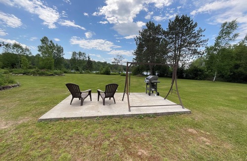 Tomahawk House | Northwoods waterfront upper one bedroom unit on the Spirit River Flowage.