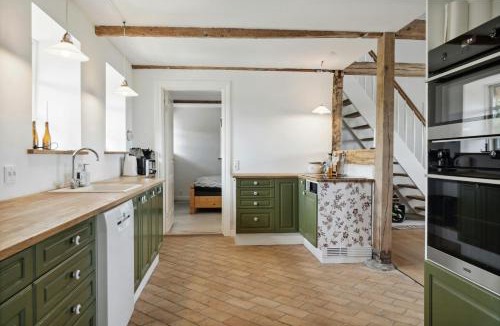 Majbolle House | Nostalgic Charm In A Yellow Timber House