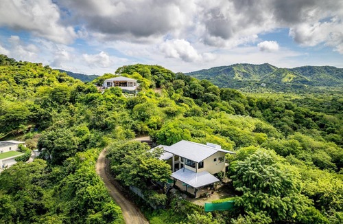 Potrero House | Nostalgic Retro Home on Luxurious Lot with a Private Infinity Pool and Ocean Views
