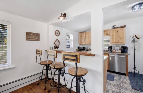 Divide Cabin | Nottingham Nook, a stylish cabin in Divide CO w/HOT TUB, game room, & seclusion!