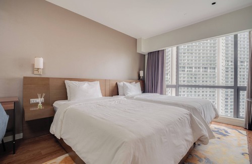 Mandaluyong Hotel | Novotel Suites Manila at Acqua w/Gym, Pool & Netflix Near Rockwell & Poblacion