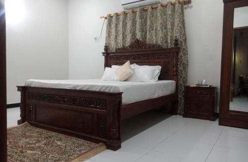 PECHS House | Nursery Inn