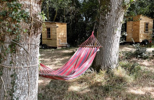 Cullompton RV Rental | Oaktree Nook Camp Secluded camping in 13 acres of magical meadow and woodland.