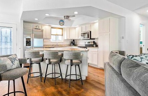 Marineland Acres House | Ocean Blue- Steps to Beach, Heated Pool, Golf Cart