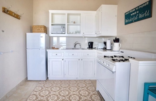 Oistins Apartment | Ocean facing spacious One Bedroom Apt two minutes walk to the beach