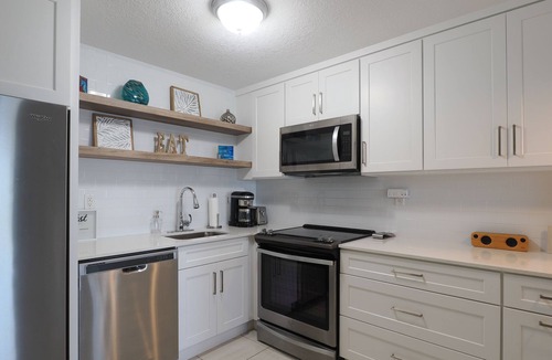 Bodden Town Apartment | Ocean front 2 bedroom condo with pool