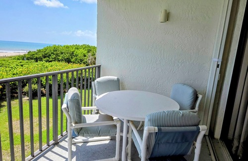 Port Canaveral Condo | OCEAN FRONT Classy, Beachy Double Balcony Condo #306 at Cape Winds Resort