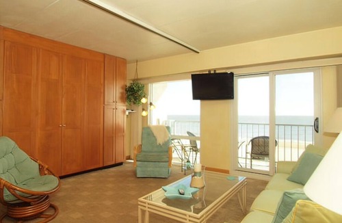 South Rehoboth Condo | OCEAN FRONT CONDO. ENJOY YOUR MORNING COFFEE SITTING ON YOUR PRIVATE BALCONY WATCHING THE SUNRISE.