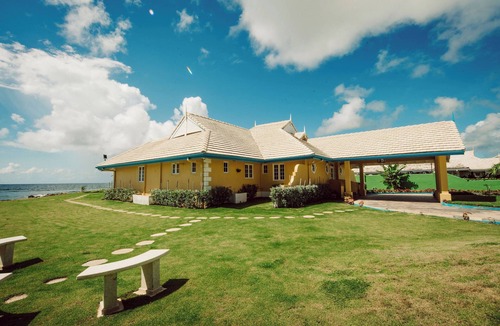 Lowlands Villa | Ocean front luxury villa in gated golf course community with private beach.