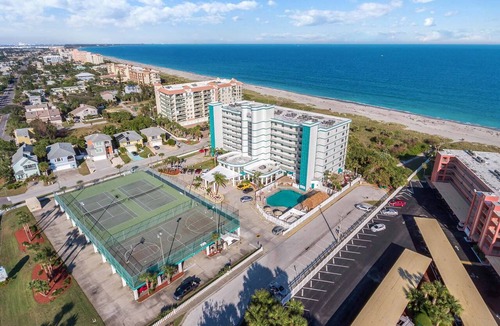 Port Canaveral Condo | Ocean Front Resort - 2BR Condo -Near the Pier - Tiki Bar - Pool - Game Room