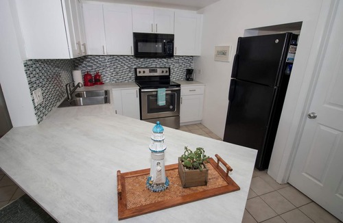 Marathon House | Ocean Side Waterfront Exclusive Affordable Home - Pool , Tennis, Fishing & Golf
