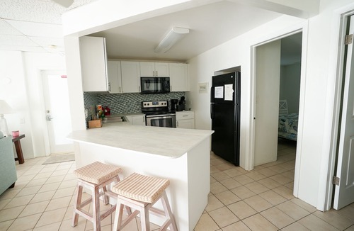Marathon House | Ocean Side Waterfront Exclusive Affordable Home - Pool , Tennis, Fishing & Golf