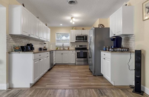Tropic Cottage | Ocean Themed Cottage With A Heated Pool Close to The Beach, Cruises, and Disney!