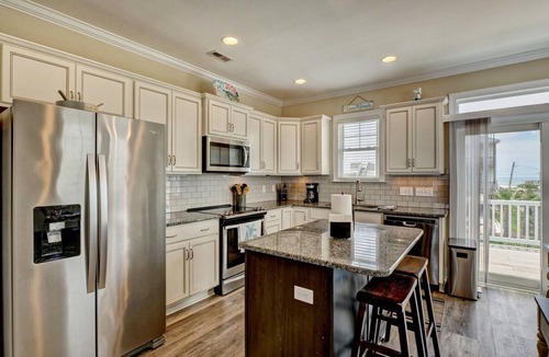 Surf City House | Ocean view, pet friendly home only steps from the beach w/EV charger Swimming Pool and hot tub