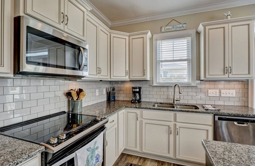Surf City House | Ocean view, pet friendly home only steps from the beach w/EV charger Swimming Pool and hot tub