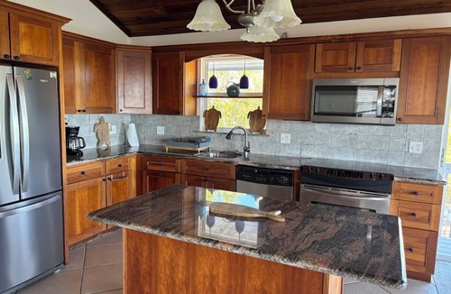 Breezeswept Beach Estates House | Oceanfront 2 bedroom, Pet friendly on Ramrod Key with screened porch and kayaks
