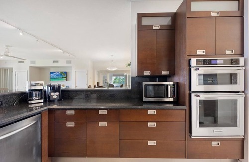 Rock Harbor Condo | Oceanfront 4BR/3BA Mariner's Club Villa 535 with Oasis Pool, Marina, Game Room & More