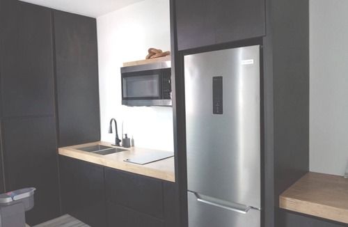 Hatillo Apartment | Oceanfront Balcony King Bed suite steps to city center and beach Sunsets walks