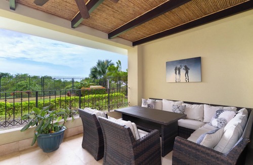 Playa Langosta Apartment | Oceanfront Beach Home with Pool and Hot Tub, Private deck and BBQ - Great for Families! - Walk to Town