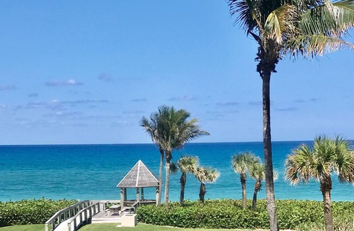 Juno Beach Condo | OceanFront Condo Renovates with Heated Pool & Hot tub Directly on the Beach!