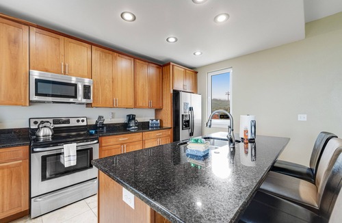 Rockaway Beach Condo | Oceanfront condo with mountain view, beach access, balcony, and washer/dryer - dog-friendly