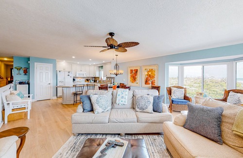 Ponce Inlet House | Oceanfront condo with scenic balconies, pool, beach gear, & W/D - dog-friendly