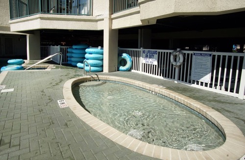 Ash Condo | Oceanfront family-sized condo rental with lazy river, pool, and fitness center near Ocean Drive