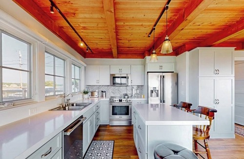 Biddeford House | Oceanfront home with stunning views of the cove & sunset, steps to the beach