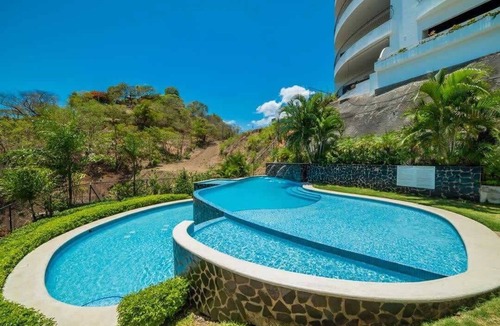 Playa Flamingo Condo | Oceanfront Infinity Pool and Sunset Veranda