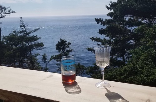 Clare Cottage | Oceanfront mini home, two decks, with spectacular views.