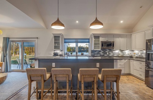 Lamoine House | Oceanfront, mobility-minded home: dock, kayaks, views, hot tub, fire pit + games