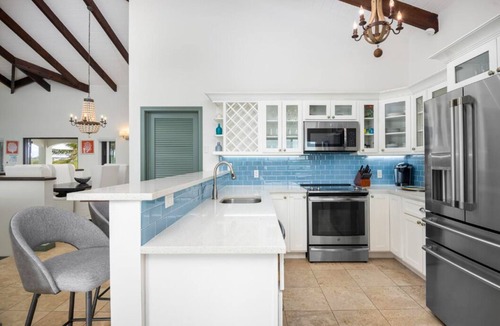 Venetian Road Settlement Villa | Oceanfront Paradise: 4-Bedroom Retreat in Turks and Caicos, Close to Attractions