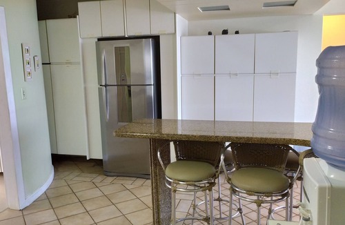 Andorinha Apartment | Oceanfront penthouse in Meia Praia, ideal for families.