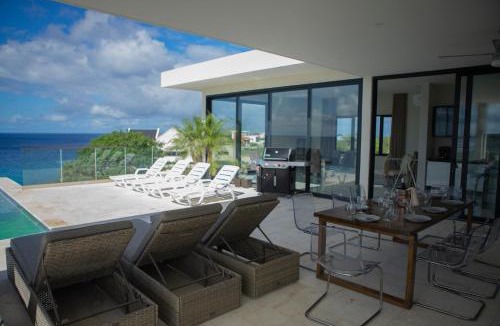 Lagun Villa | Oceanfront Private Pier waterfront Caribbean sea Villa