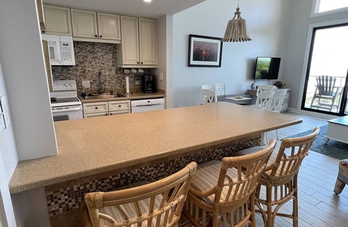 West Beach Village Villa | Oceanfront top floor condo, sunrises, dolphins, breezes, THREE private balconies