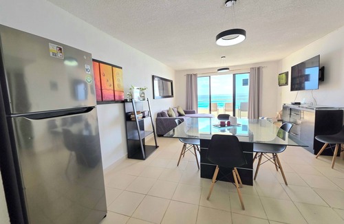 Zona Hotelera Condo | Oceanfront white sand beach condo