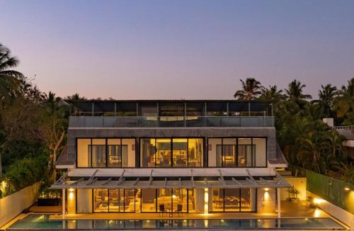 Verem Villa | Oceanic Sunsets with River View, Comp Breakfast & Infinity Pool at StayVista