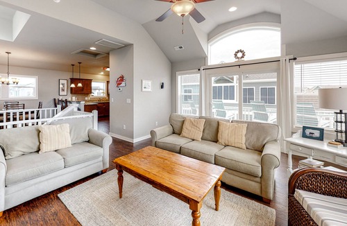 Whalehead Beach House | Oceanside home with private hot tub, central AC, fireplace, and pool access