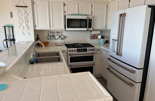 Townsite Condo | OCEANSIDE OASIS: Beach Front - Breathtaking Ocean, Pier, Strand, & Sunset Views