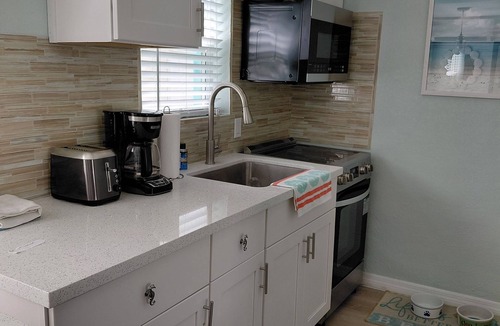 Windley Key House | OCEANVIEW, ISLAMORADA - newly refreshed concrete conch cottage & tiki