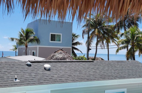 Windley Key House | OCEANVIEW, ISLAMORADA - newly refreshed concrete conch cottage & tiki