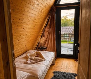 Ocna Mures Ski Chalet | Ocna Frame - A Frame cu Jacuzzi si Terasa