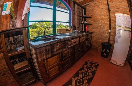 Laguna House | Octagonal house in demolition wood (OkaMauna)
